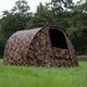 V2 Speedflex bivvy overwrap in DPM camouflage design set up outdoors on grassy landscape.
